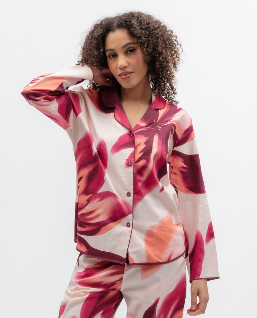 Model wearing a pink floral pyjama top